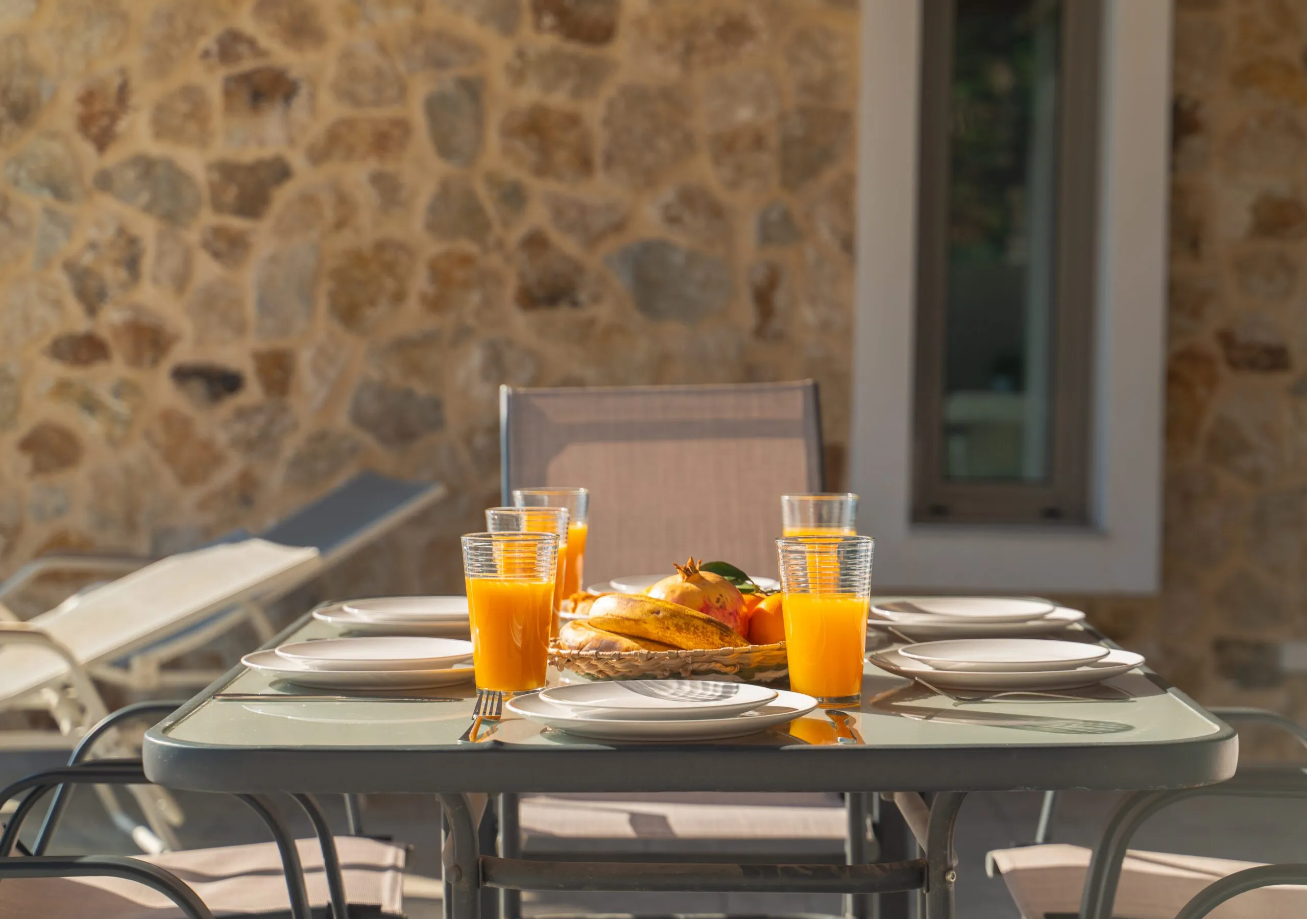 Breakfast with orange juice on the terrace