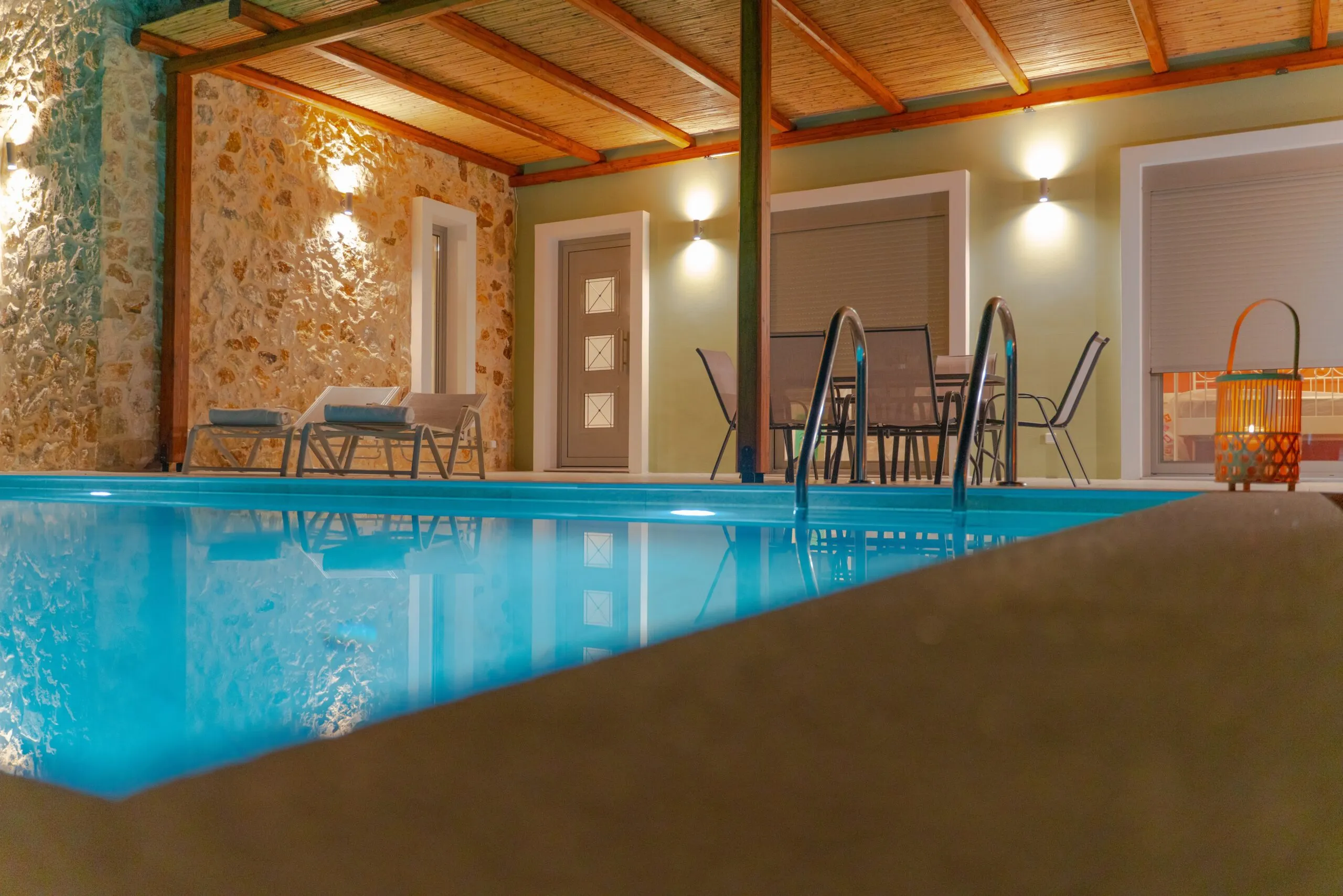 Pool and covered pergola in the evening